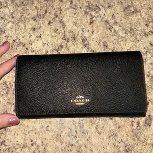 Black coach trifold wallet